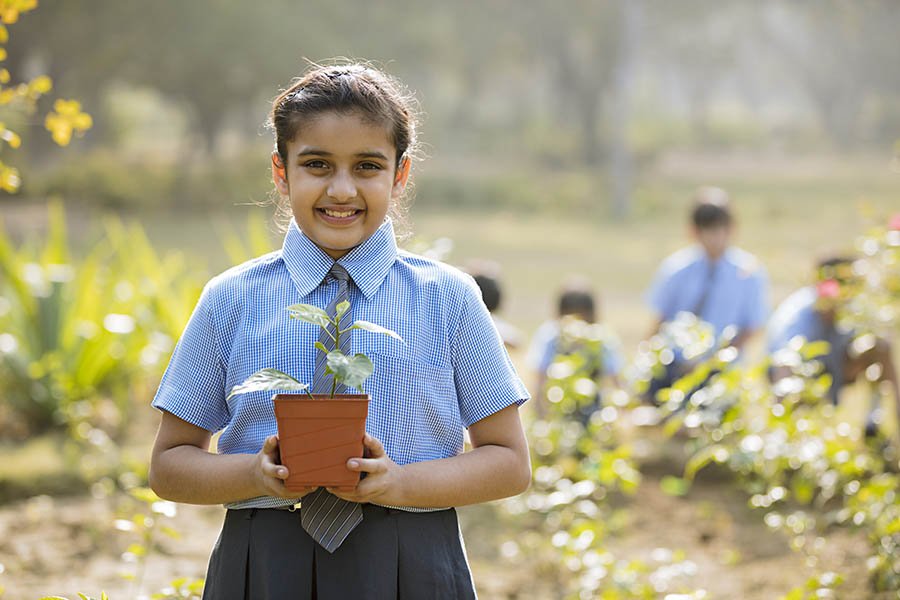 Girl with sapling